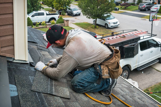 Professional Roofing technician working in Palisades, WA